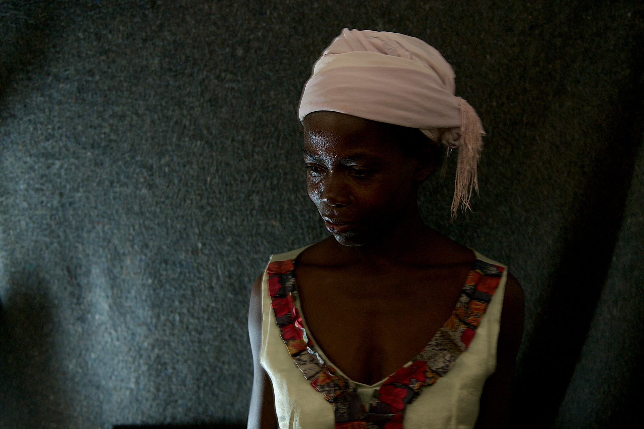 A portrait of a woman from DRC who has received support after fleeing gender based violence