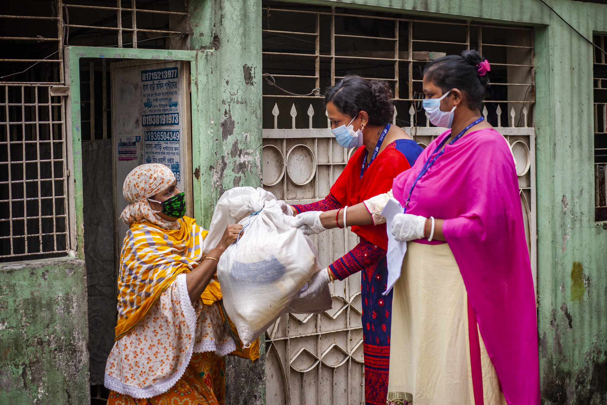 Women in Bangladesh providing feed aid